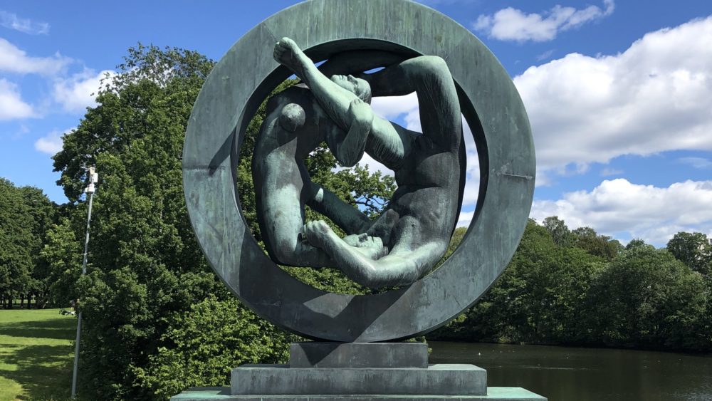 Empathy is Connection - Statue of couple connecting